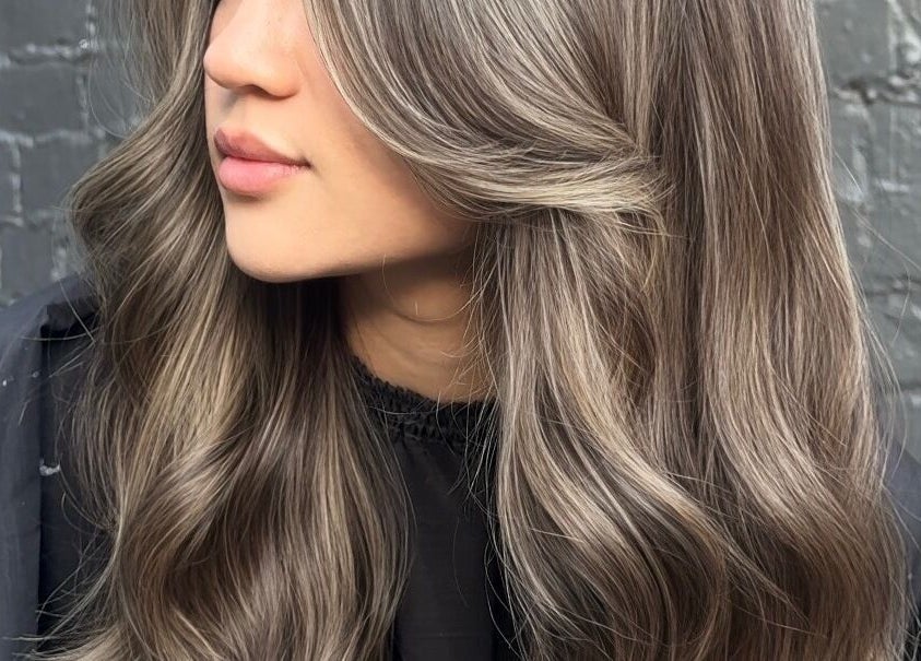 Elegant brunette hairstyle at Studio Deja Wu, Melbourne, Victoria, AU, showcasing expert salon styling.