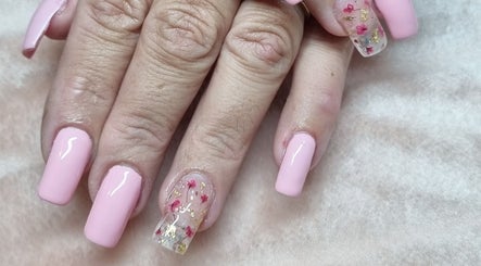 Elegant pink nails with floral design at Fabeauty, Maroochydore, Queensland, AU.