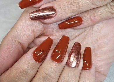 Stylish red and metallic manicure at Fabeauty, Maroochydore, Queensland, AU.