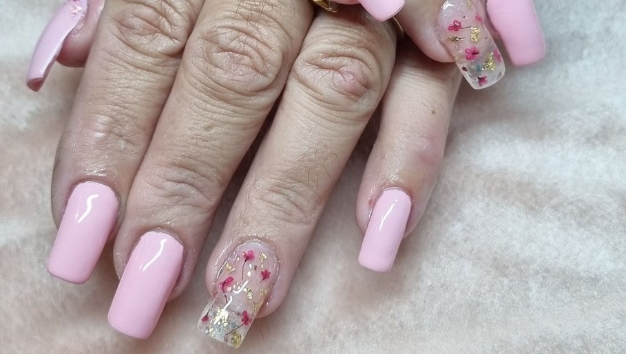 Elegant pink manicure with floral accents at Fabeauty, Maroochydore, Queensland, AU.