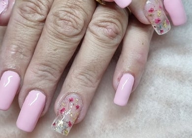 Elegant pink manicure with floral accents at Fabeauty, Maroochydore, Queensland, AU.