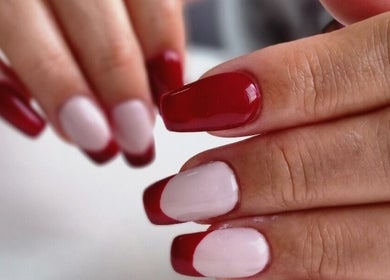 Elegant red and white French manicure at Fabeauty, Maroochydore, Queensland, AU offering premium nail services.