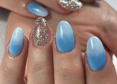 Elegant blue ombre nails with glitter accent at Fabeauty - Private home-based beauty studio, Maroochydore, Queensland, AU.