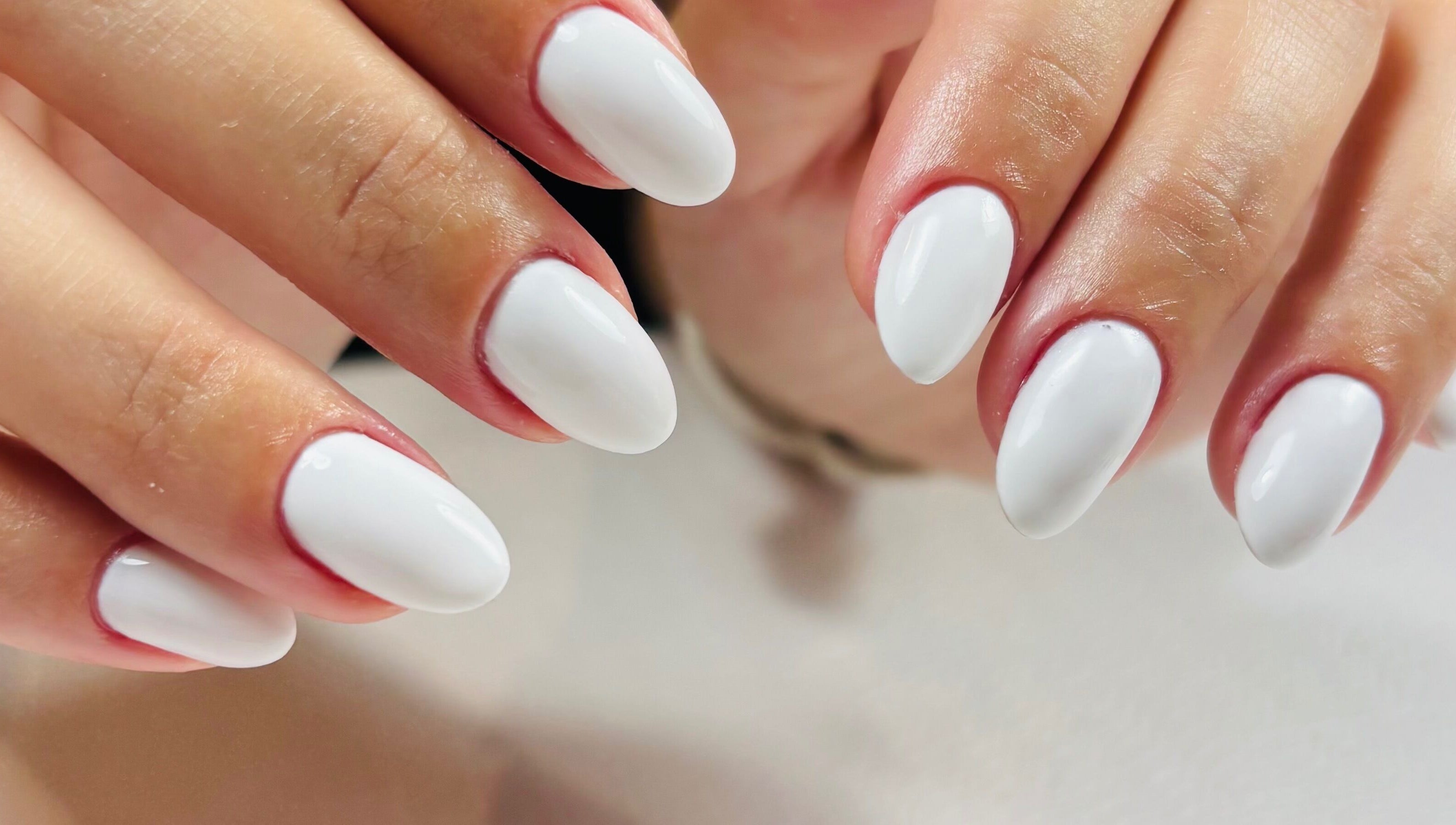 Close-up of a pristine white manicure at Fabeauty - Private home-based beauty studio, Maroochydore, Queensland, AU.
