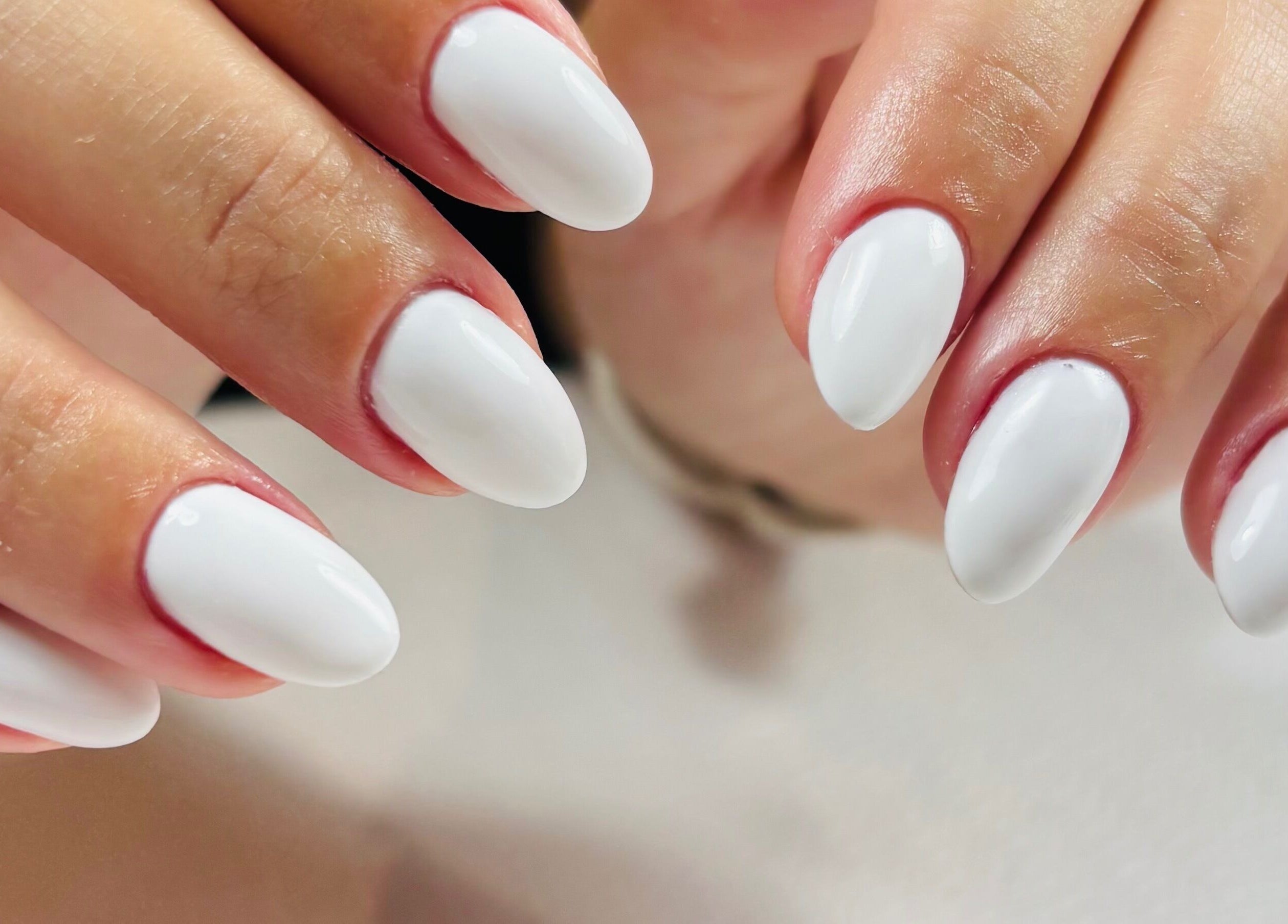 Close-up of a pristine white manicure at Fabeauty - Private home-based beauty studio, Maroochydore, Queensland, AU.