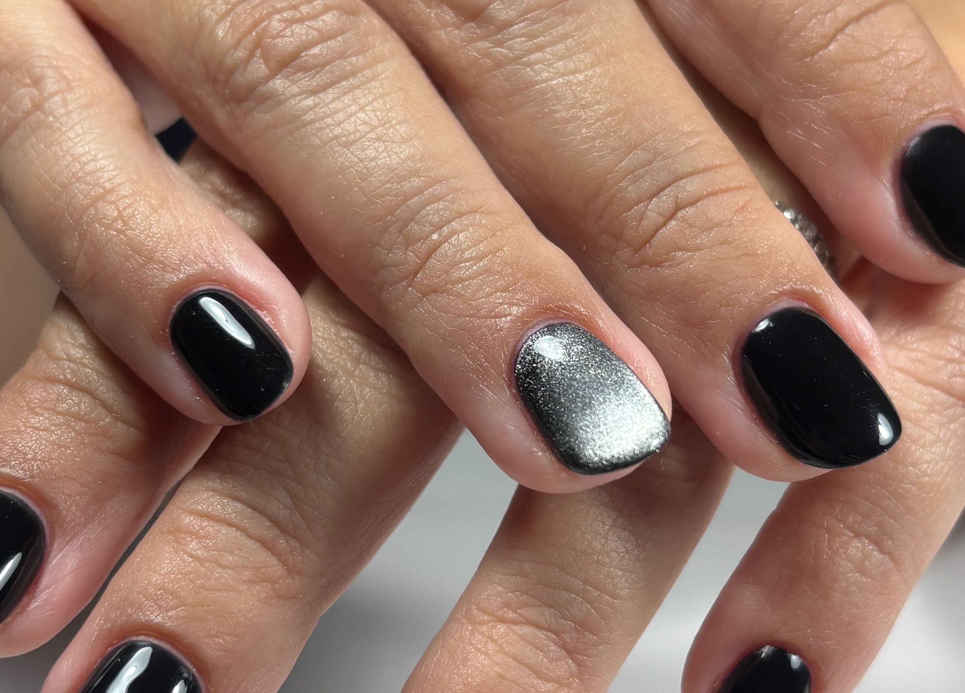 Glossy black and silver nails at Fabeauty - Private home-based beauty studio, Maroochydore, Queensland, AU.