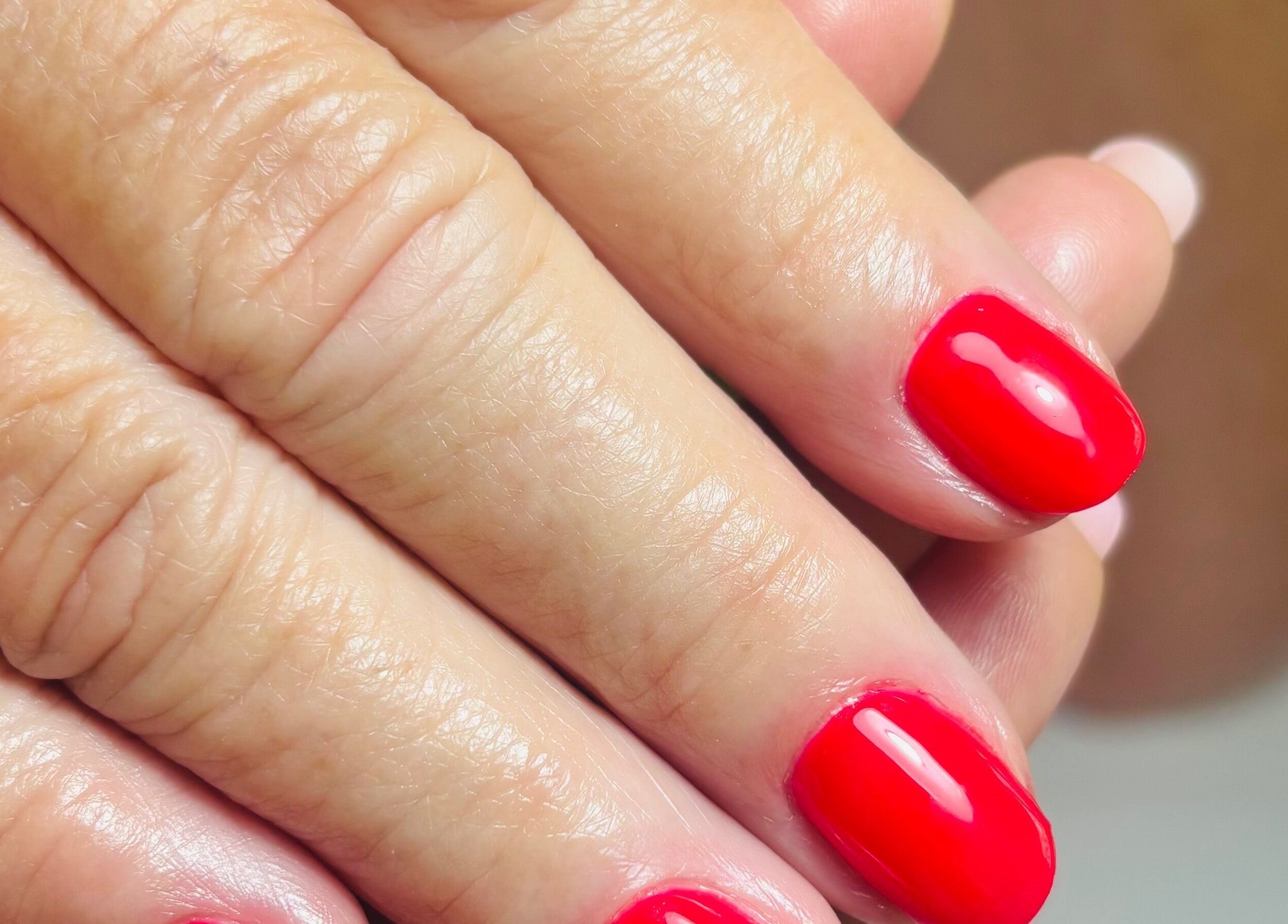Red manicured nails at Fabeauty - Private home-based beauty studio, Maroochydore, Queensland, AU.