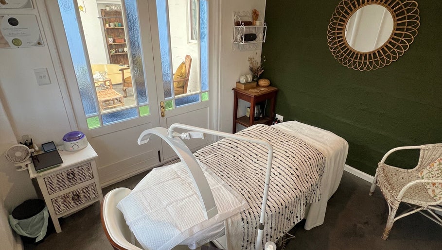 Cozy treatment room at Lada Beauty Studio, Cape Town, with elegant decor and calming ambiance.
