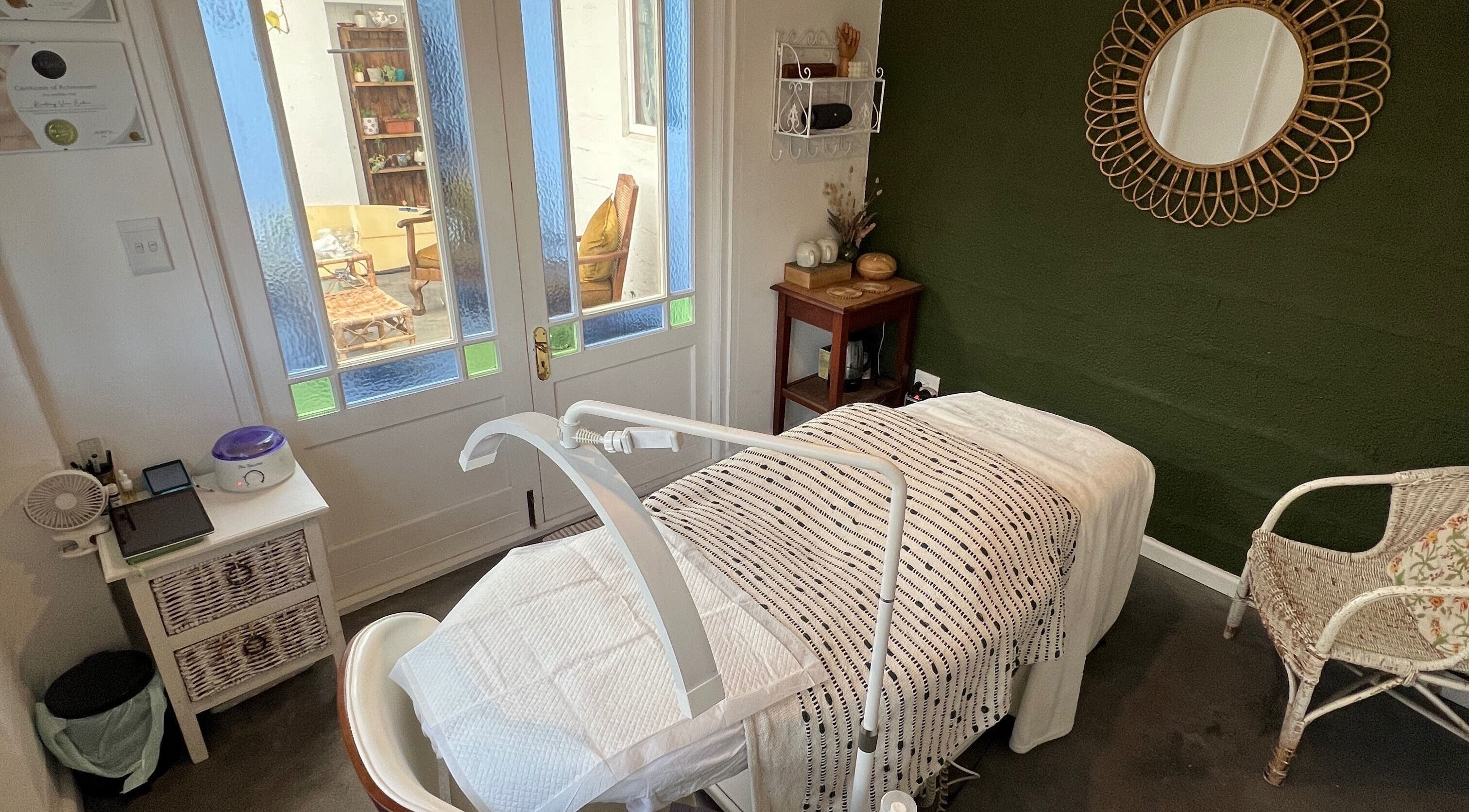 Cozy treatment room at Lada Beauty Studio, Cape Town, Western Cape, ZA, featuring elegant decor and tranquil ambiance.