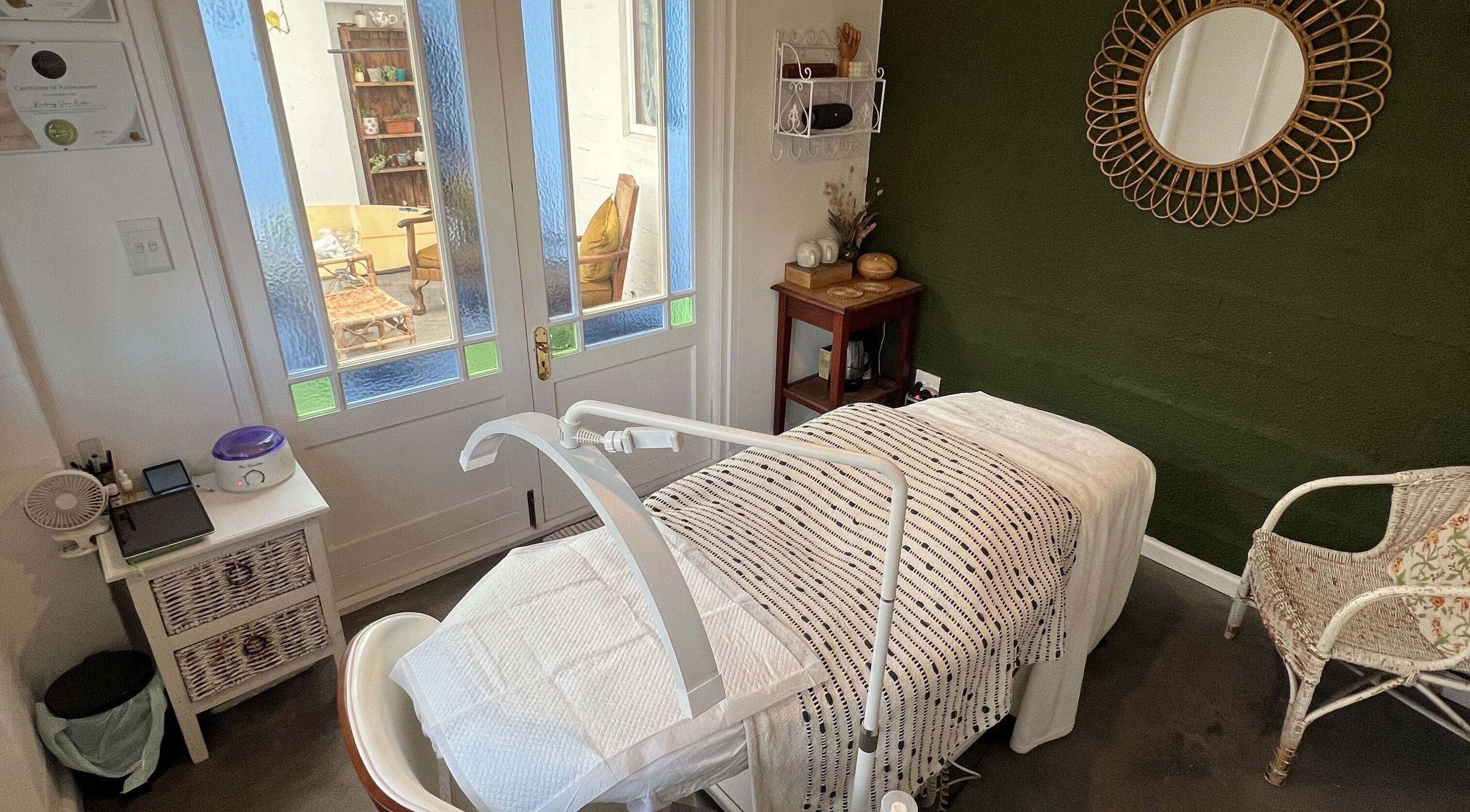 Cozy treatment room at Lada Beauty Studio, Cape Town, Western Cape, ZA, featuring elegant decor and tranquil ambiance.