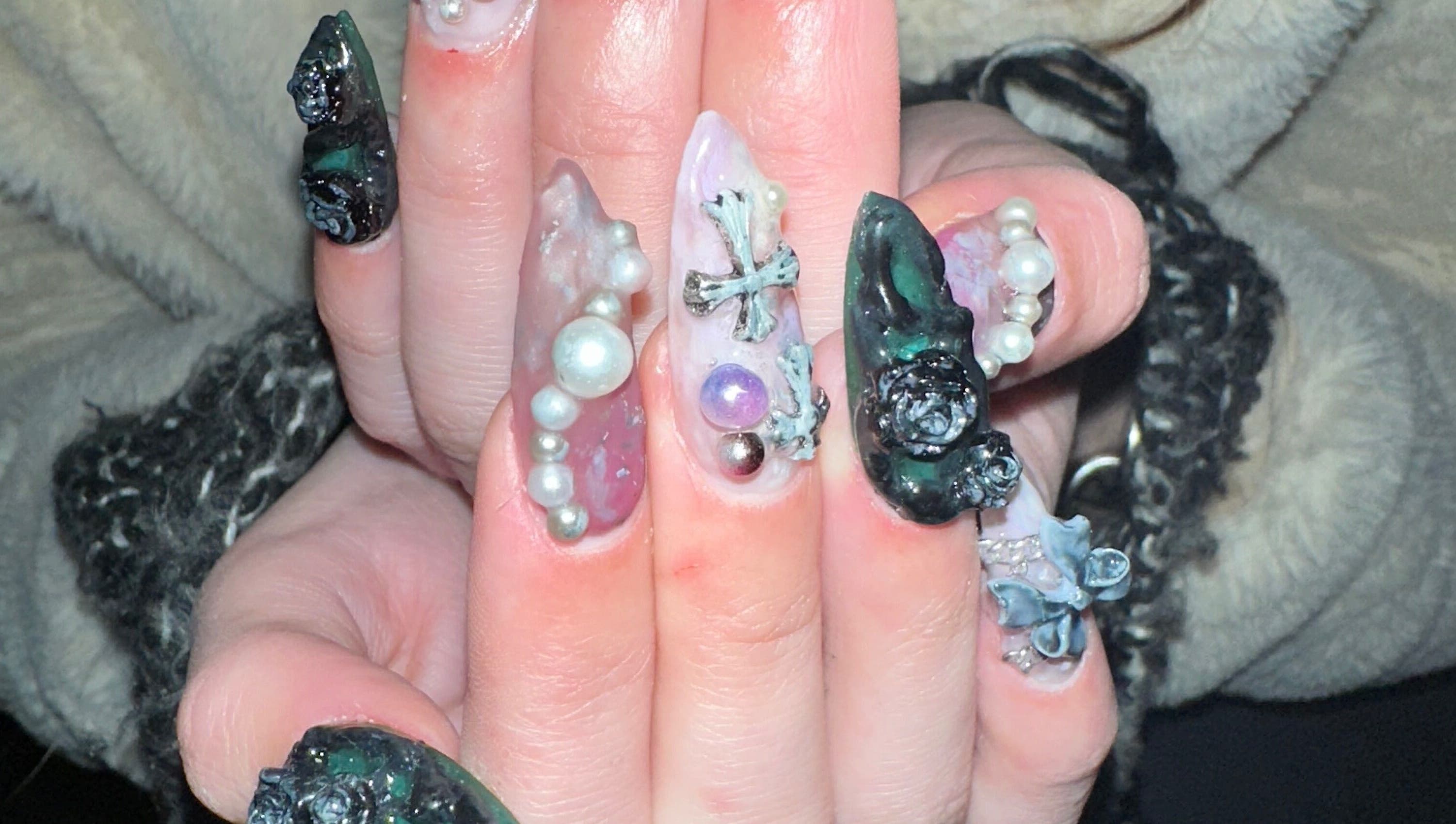 Unique 3D nail art design from Journey to the Nails, London, England, GB featuring intricate embellishments.