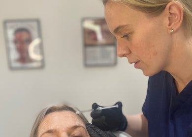 Professional administering treatment at hd aesthetics Bearsted in Bearsted, England, GB.