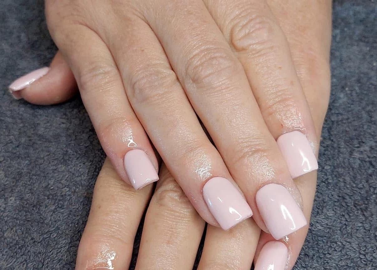 Elegant glossy pink manicure at Nail Artistry by Chelsea Lee, Gqeberha, Eastern Cape, ZA.