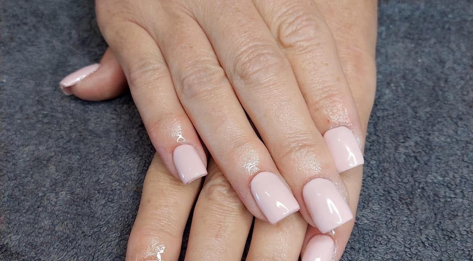 Elegant glossy pink manicure at Nail Artistry by Chelsea Lee, Gqeberha, Eastern Cape, ZA.