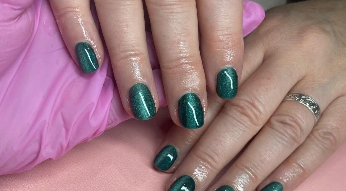 Emerald nail design at Nail Artistry by Chelsea in Gqeberha, Eastern Cape, ZA, showcasing detailed manicure.