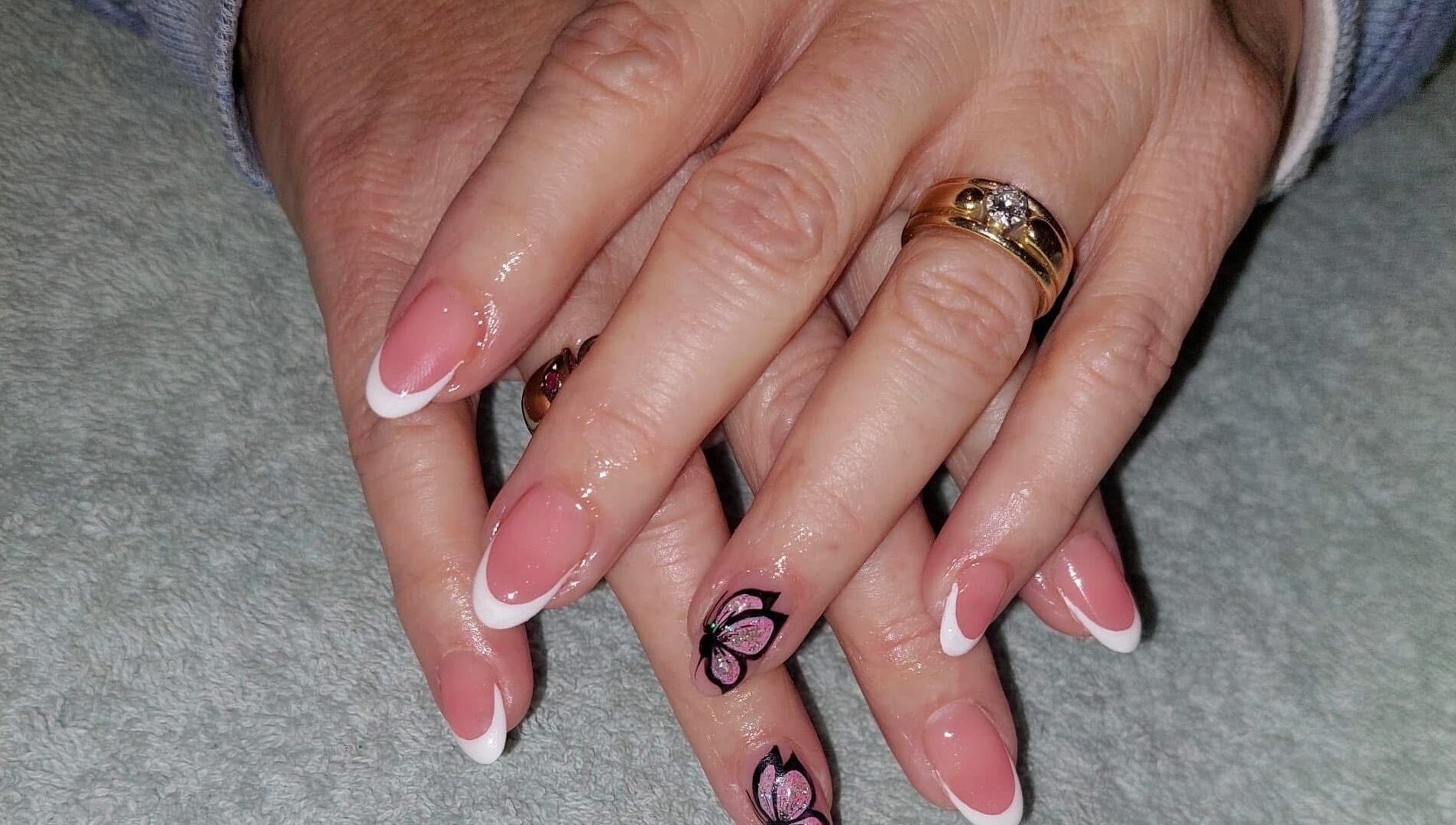 French manicure with floral art at Nail Artistry by Chelsea, Gqeberha, Eastern Cape, ZA.