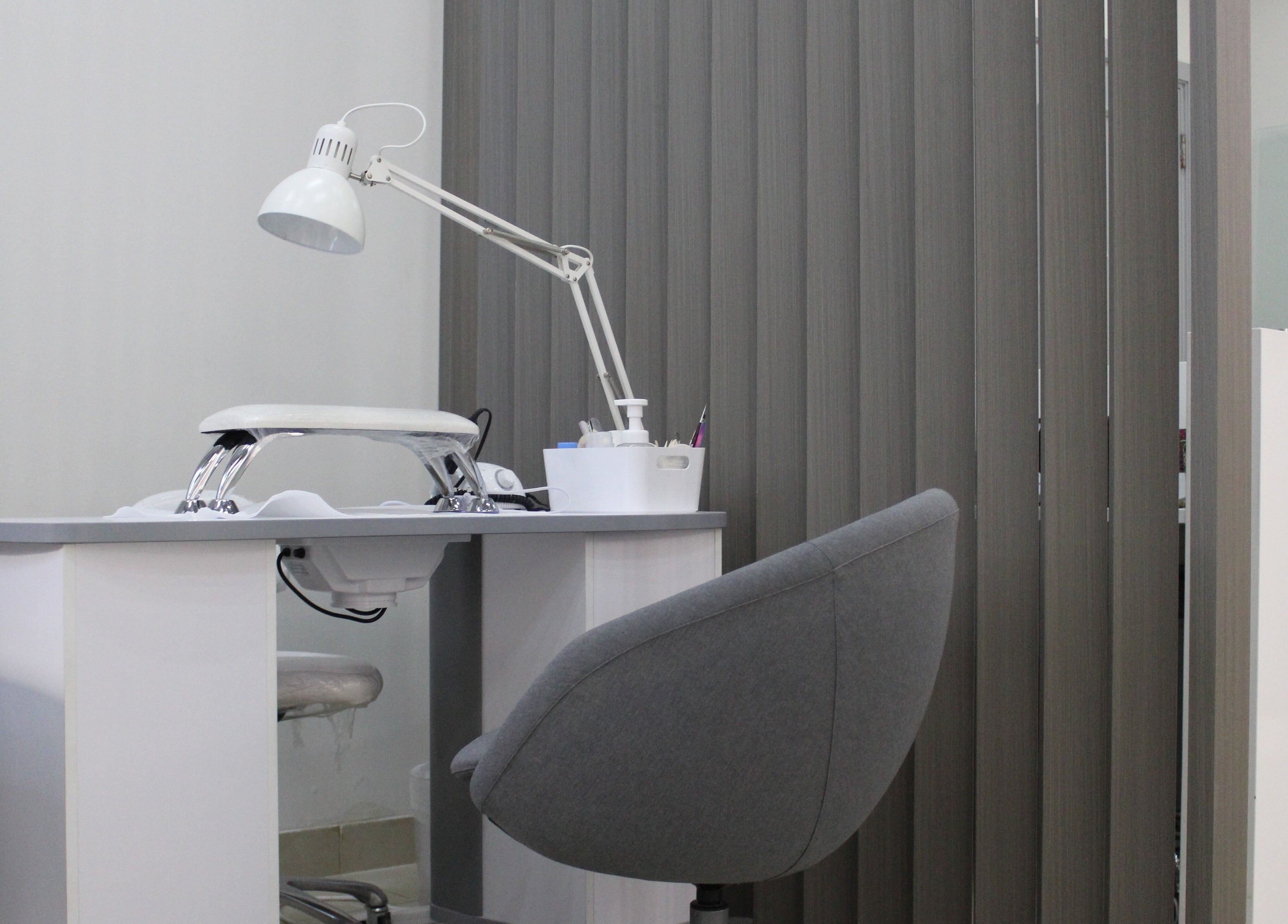 Modern nail station at Lashes & Brows Studio Ladies Salon, Abu Dhabi, AE, designed for comfort and style.