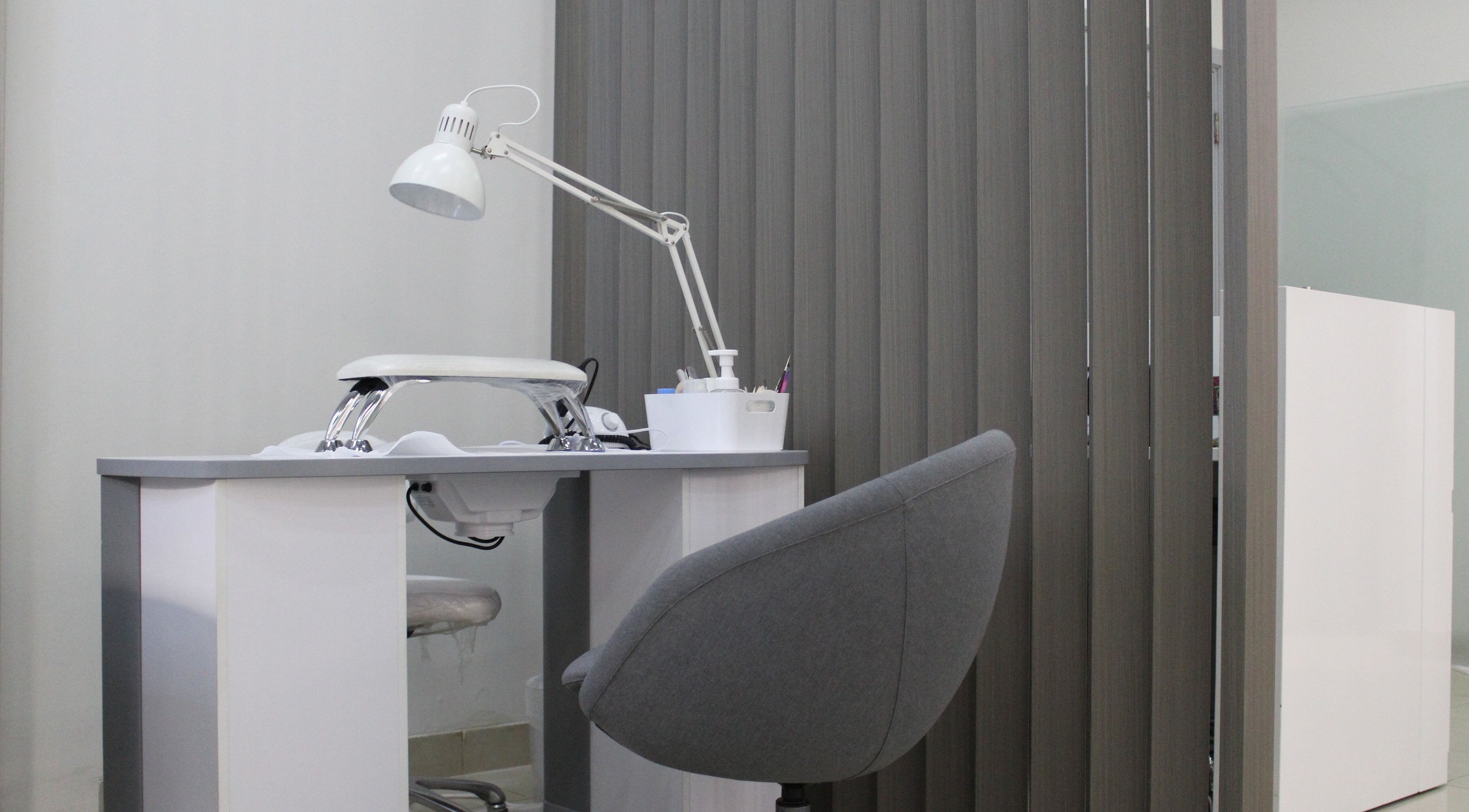 Modern nail station at Lashes & Brows Studio Ladies Salon, Abu Dhabi, AE, designed for comfort and style.