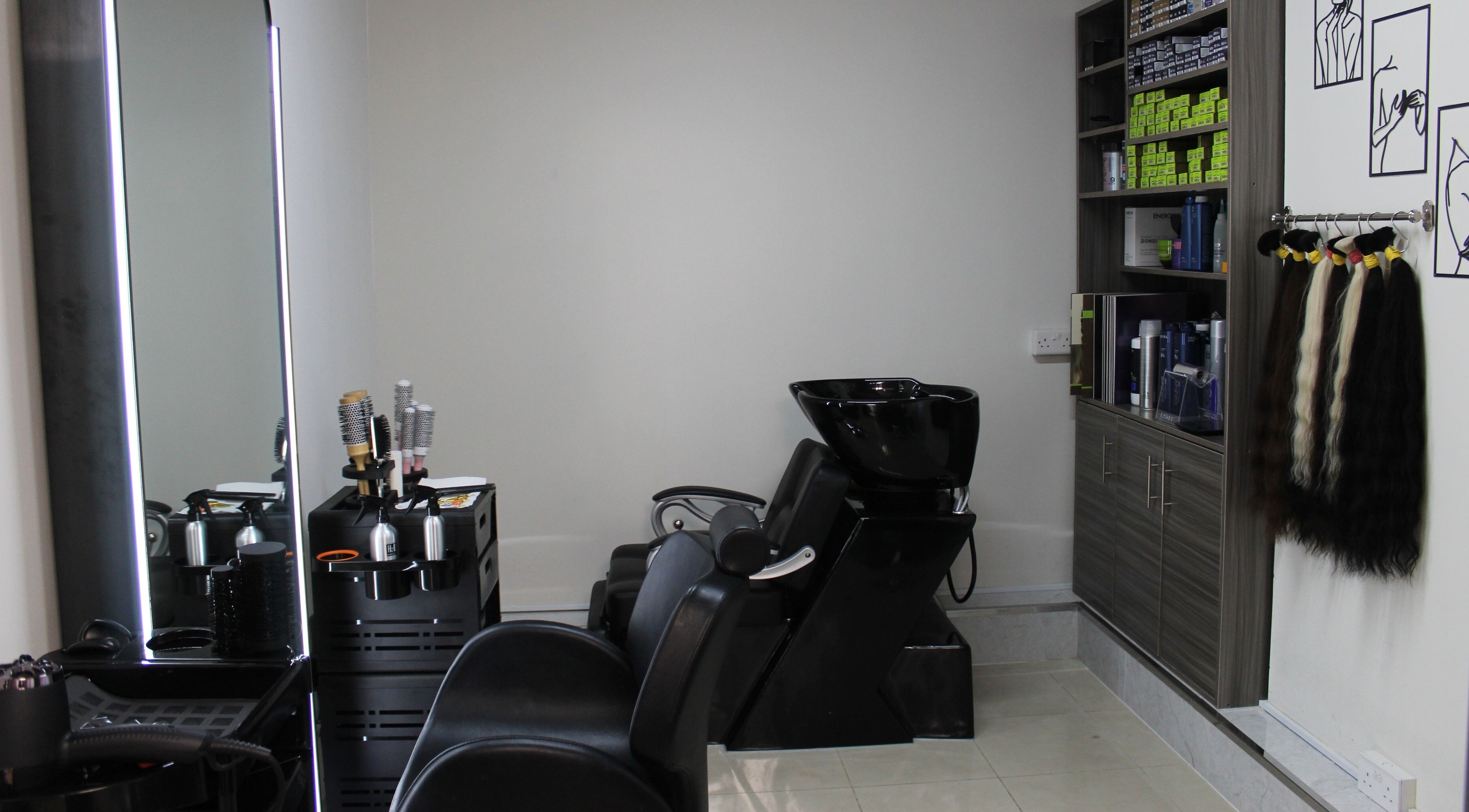 Modern interior of Lashes & Brows Studio Ladies Salon in Abu Dhabi, AE with chic salon chairs and equipment.
