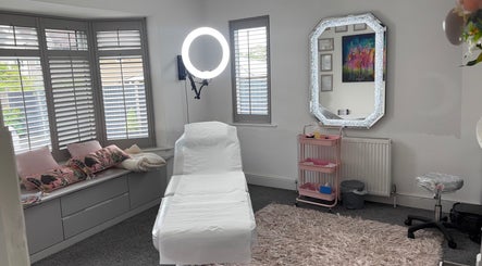 Cozy treatment room at Permanent Aesthetics Studio, Burton Upon Trent, England, GB with modern decor.