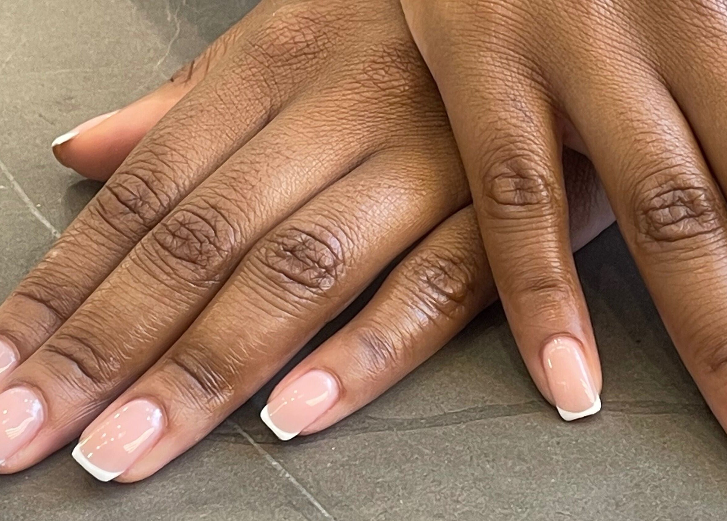 Elegant French manicure at Nami Beauty, Labone in Accra, Greater Accra Region, GH. Experience premium nail care.
