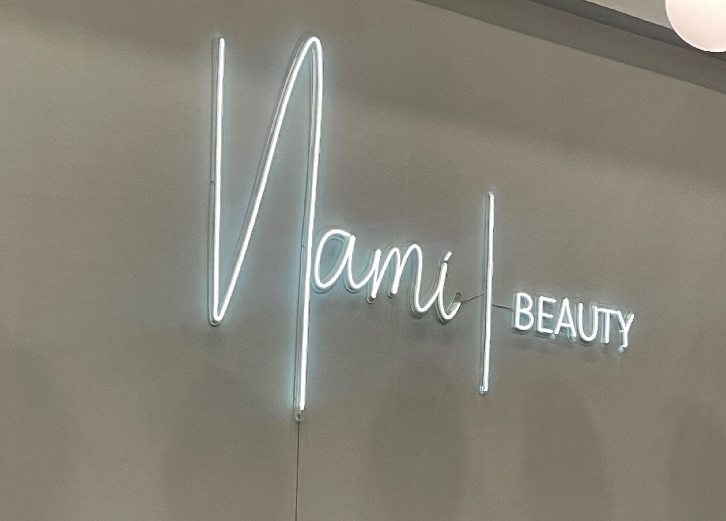 Neon sign displaying 'Nami Beauty, Labone' at Accra, Greater Accra Region, GH.