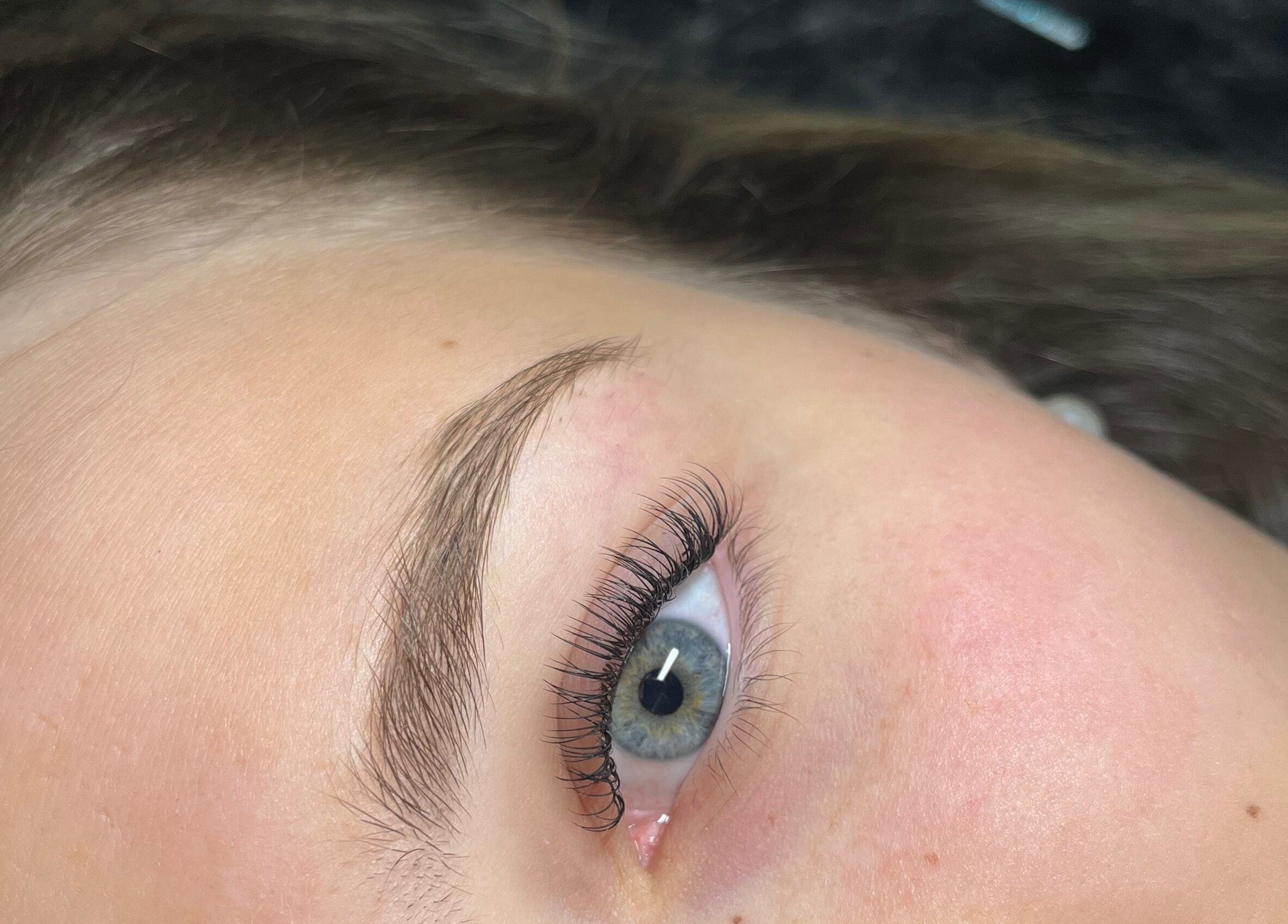 Close-up of expertly shaped eyebrow at STUDIO24, Swords, County Dublin, IE showcasing precise beauty treatment.