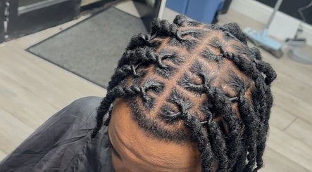 Intricate braided hairstyle at Princess Parlour in Nottingham, England, GB.