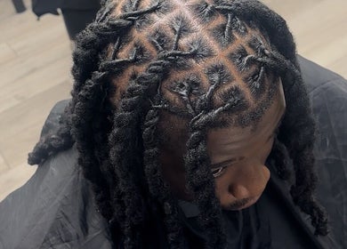 Detailed braided hairstyle at Princess Parlour, Nottingham, England, GB.