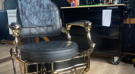 Luxurious barber chair at Black Sheep Barbershop in Kawartha Lakes, Ontario, CA, showcasing elegance and comfort.