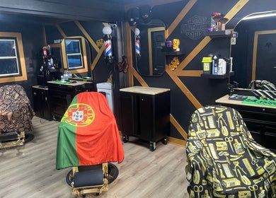 Black Sheep Barbershop in Kawartha Lakes, Ontario, CA features a modern interior with styled barber chairs.