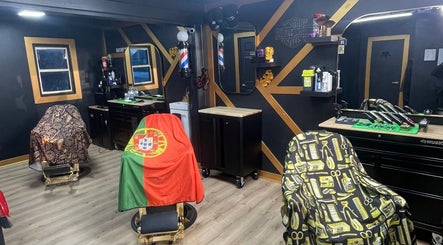 Black Sheep Barbershop in Kawartha Lakes, Ontario, CA features a modern interior with styled barber chairs.