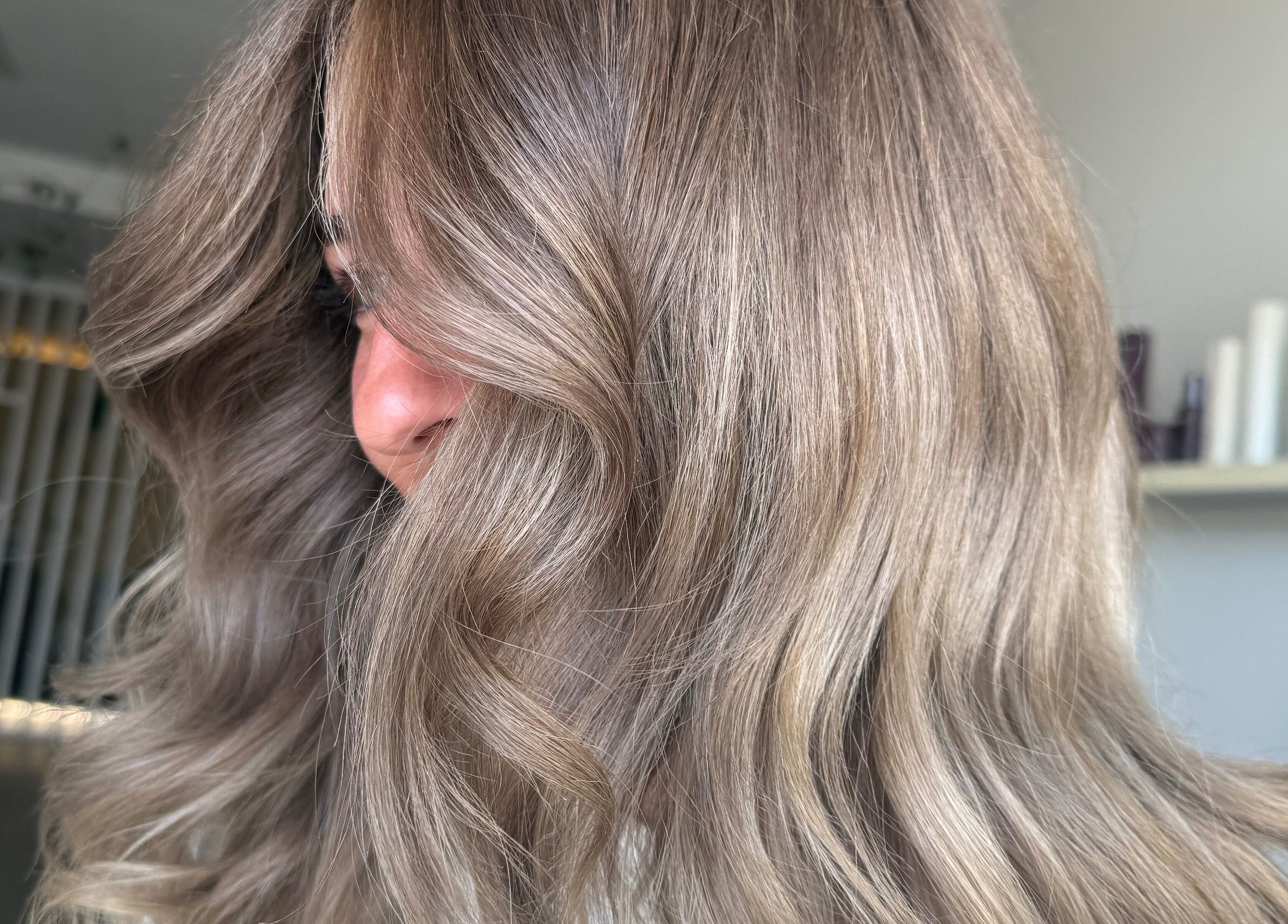 Elegant wavy blonde hair styled at Two by the Sea Salon, Christies Beach, South Australia, AU.