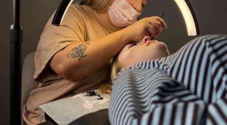 Eyelash extension procedure at Banksia Beauty Studio in Melbourne, Victoria, AU.