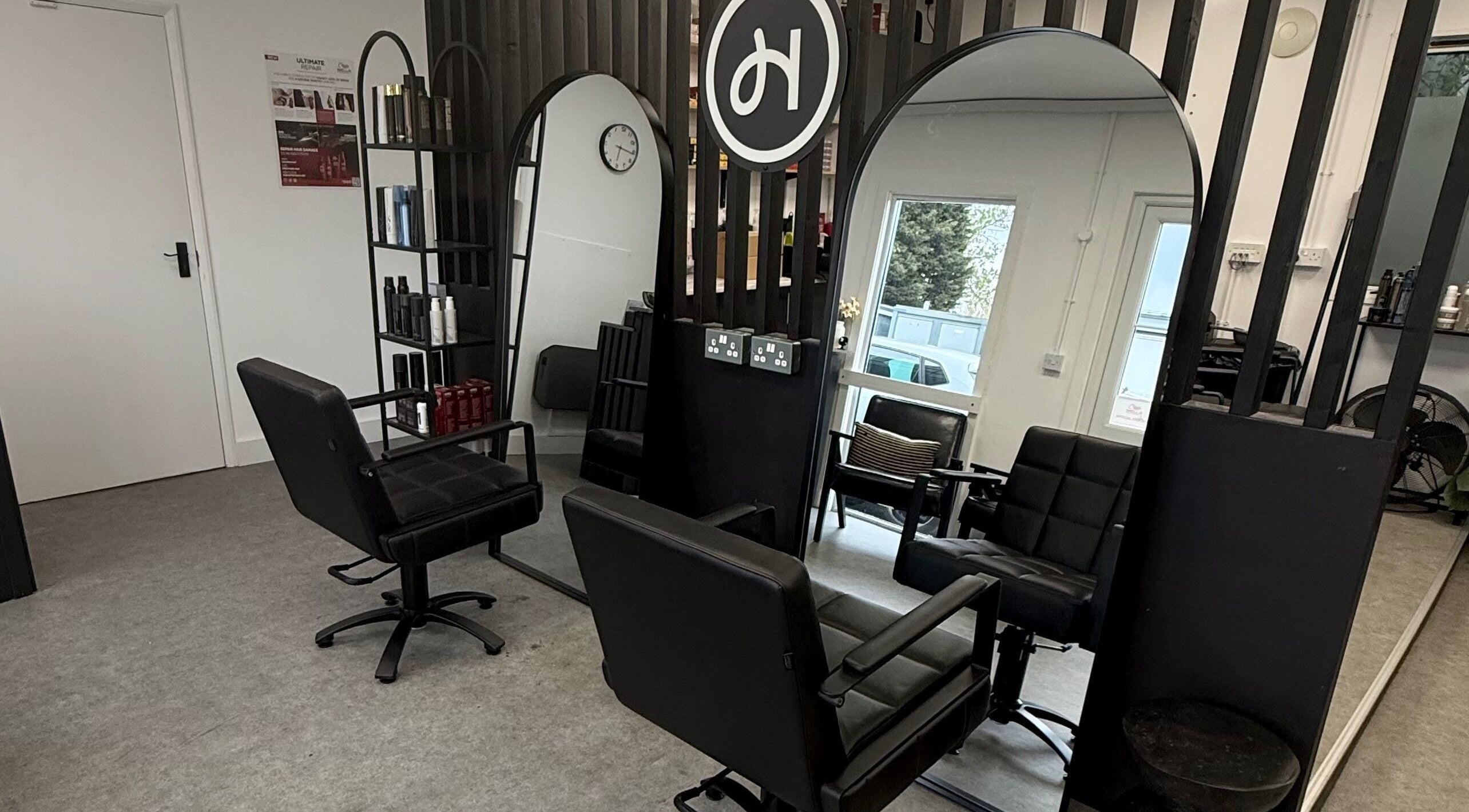 Modern salon stations at The Hair Hub Northampton, located in Northampton, England, GB.