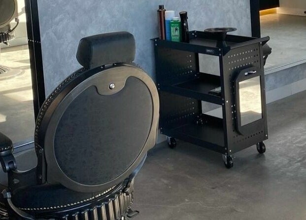 Modern salon chair and trolley at Sarmo & Co., Melbourne, Victoria, AU.