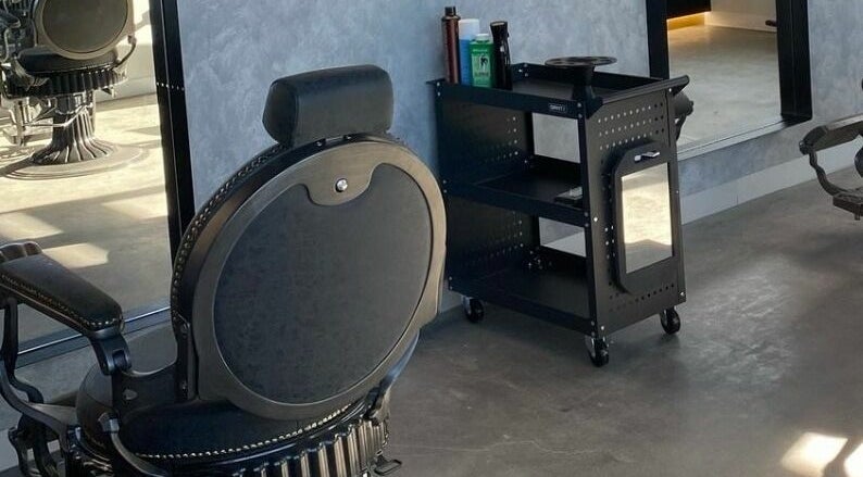 Modern salon chair and trolley at Sarmo & Co., Melbourne, Victoria, AU.