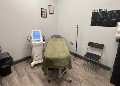 Cozy treatment room at The Skin and Sculpt Studio, Ashton-under-lyne, England, GB. Modern equipment and peaceful ambiance.