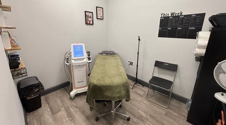 Cozy treatment room at The Skin and Sculpt Studio, Ashton-under-lyne, England, GB. Modern equipment and peaceful ambiance.