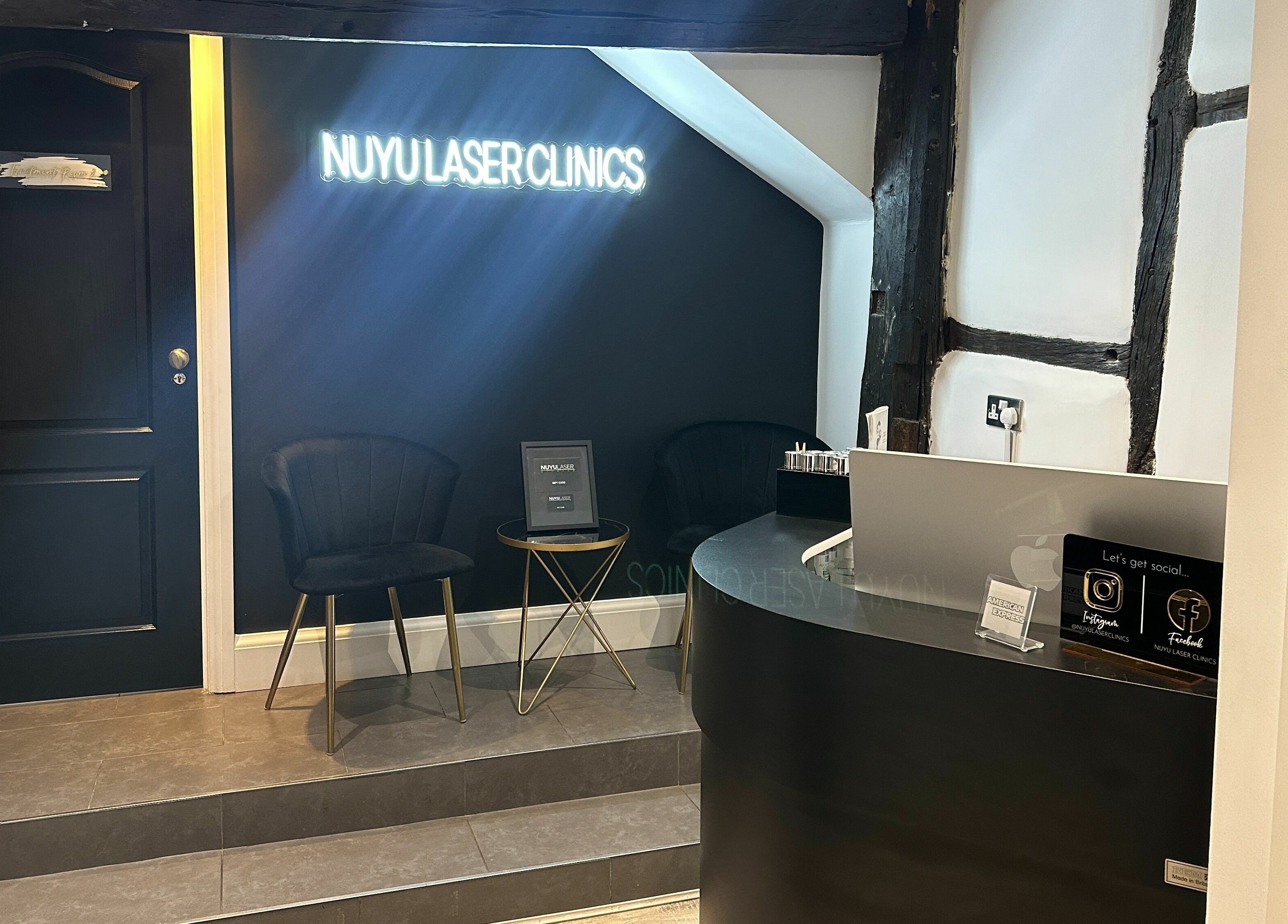 Elegant reception at NUYU Laser & Aesthetics Clinics, Lichfield, England, GB with stylish decor.
