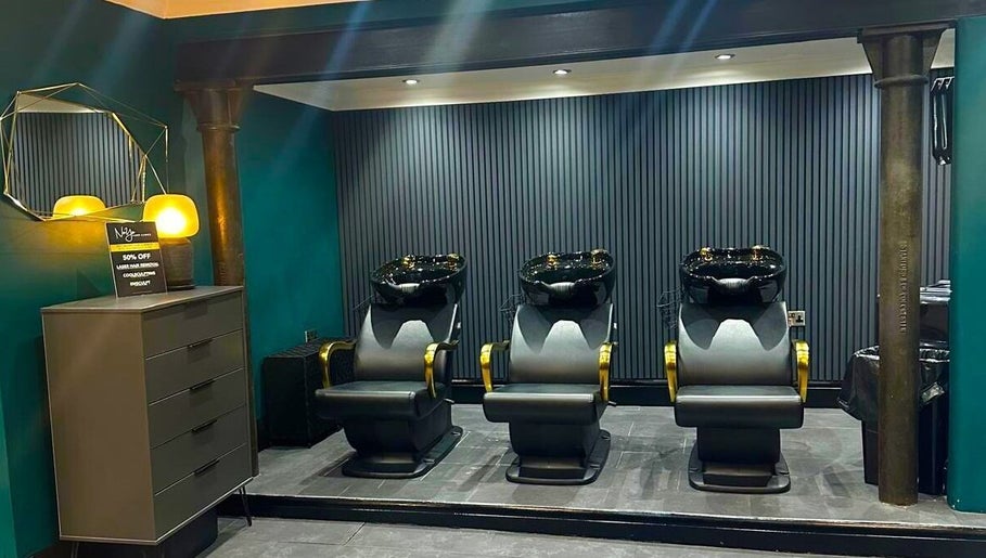 Elegant wash stations at Nuyu Hair & Beauty Salon in Lichfield, England, GB, offering premium hair care services.