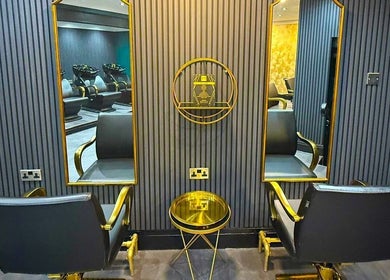 Luxurious styling station at Nuyu Hair & Beauty Salon, Lichfield, England, GB, featuring elegant chairs and mirrors.