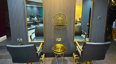 Luxurious styling station at Nuyu Hair & Beauty Salon, Lichfield, England, GB, featuring elegant chairs and mirrors.