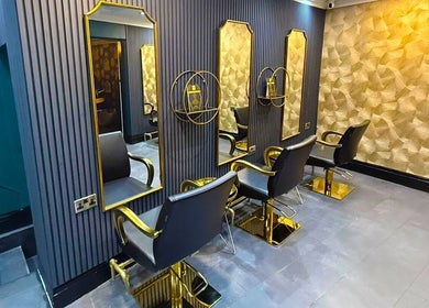 Chic salon chairs and mirrors at Nuyu Hair & Beauty Salon in Lichfield, England, GB with stylish decor.