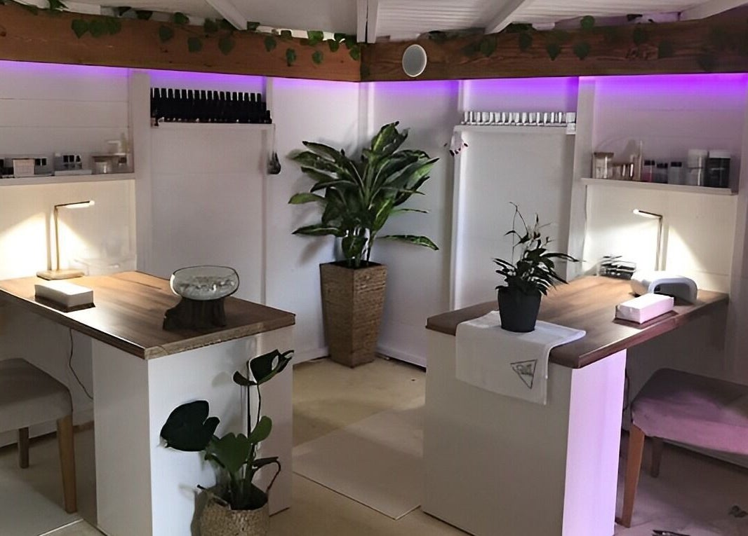 Calming interior of Menevia Bathhouse and Spa in St Davids, Wales, GB with ambient lighting and lush plants.