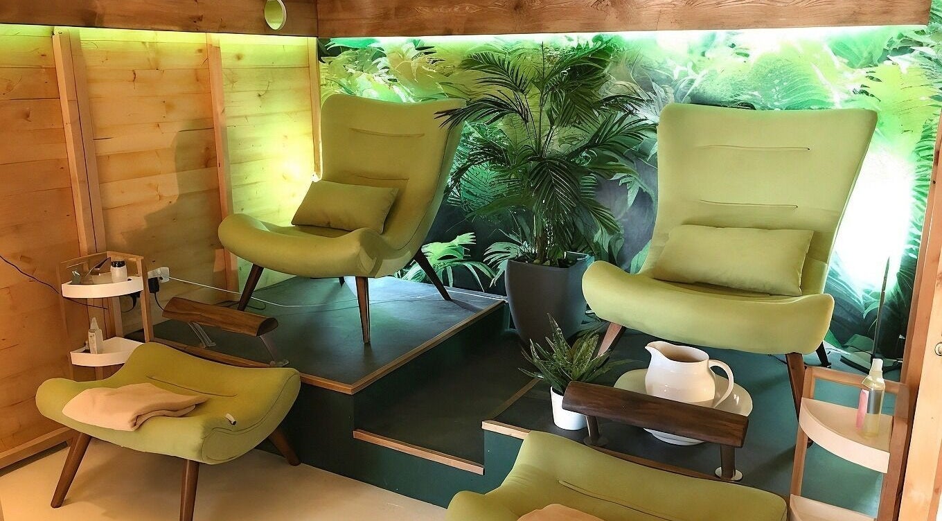 Relaxing lounge chairs at Menevia Bathhouse and Spa, St Davids, Wales, GB, offering a tranquil atmosphere.