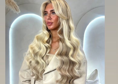 Glamorous long blond waves styled at Slae Salon, North Shields, England, GB.