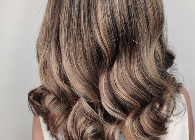 Stylish wavy hairstyle at Abbie Bellchambers Hair Salon in Shepshed, England, GB.