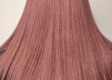 Shiny, straight brunette hair styled at Abbie Bellchambers Hair Salon, Shepshed, England, GB.