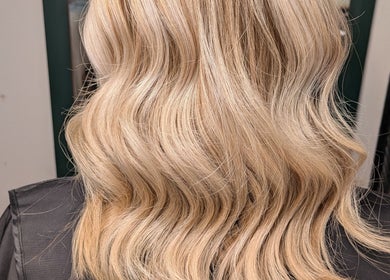 Stylish blonde waves at Abbie Bellchambers Hair Salon in Shepshed, England, GB.